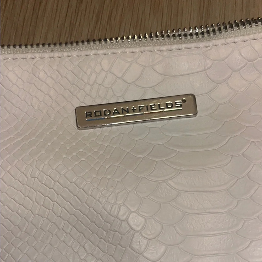Rodan + Fields White Embossed Clutch - Picture 2 of 6